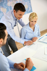 Business people meeting around table