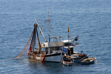 Pulling the fishing net on the boat in Adriatic sea, Croatia