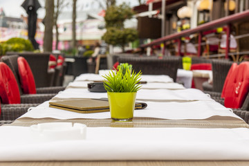Empty table - street restaurant in Brugge, Belgium.