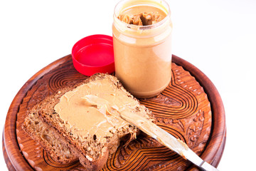 Peanut butter sandwich on a wooden board