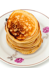 Stack of pancakes isolated on white