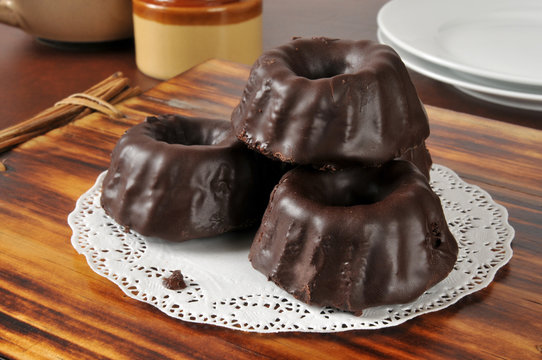 Stack Of Mini Chocolate Covered Bundt Cakes