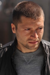 Fototapeta premium Male actor headshot showing action movie charackter