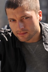 Male actor headshot showing action movie charackter