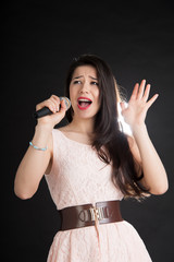 beautiful singer on a black background