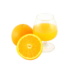 Orange juice in brandy glass and one half fruit