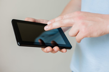 Man uses a digital tablet