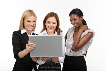 Three businesswoman with laptop