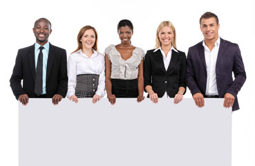 Group of people holding board