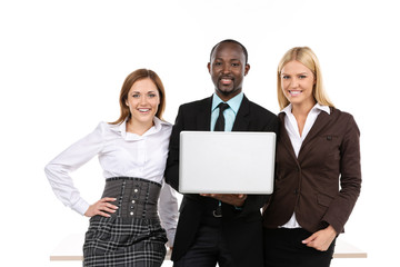 Three business people holding laptop