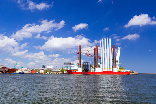 Shipyard in Gdynia with wind turbine installation vessel, Poland