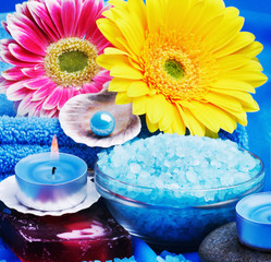 spa products and gerbera flowers