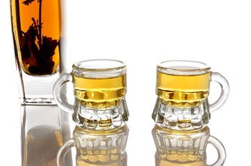brandy with herb and two glasses