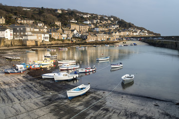 A traditional Cornish fishing village and harbor