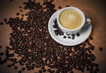 Coffee cup with beans