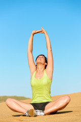 Woman yoga and relax on beach