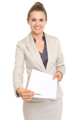 Happy business woman giving document for sign