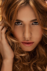 Fototapeta premium woman with long curly hair