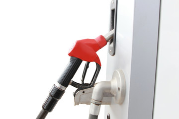 red fuel dispenser at the gas station