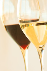 Close up on glasses of red and white wine