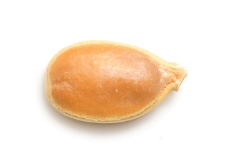 Pumpkin seeds on a white background. macro