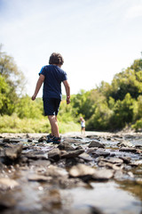 Children playing in a river