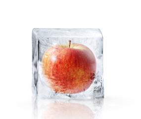 Red Apple frozen inside big ice