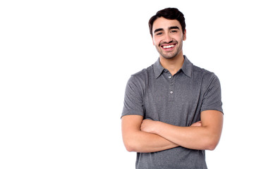 Obraz premium Handsome young cheerful guy in casual clothes