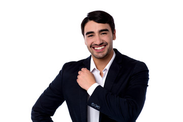 Good looking casual smiling young businessman