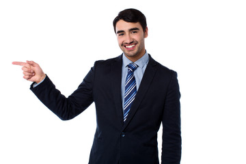 Smart businessman pointing at something