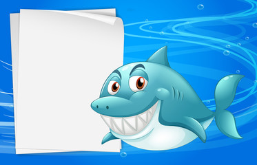 A shark with an empty bondpaper under the sea