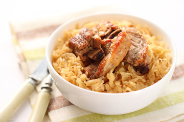 Pork ribs baked with sauerkraut