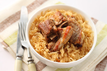 Pork ribs baked with sauerkraut