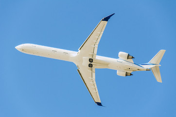 Jet plane flying on blue sky