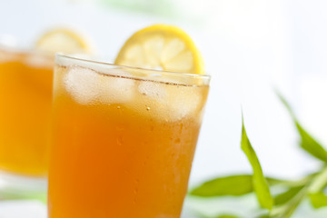 Glass of ice tea with lemon