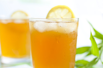 Glass of ice tea with lemon