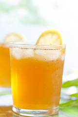 Glass of ice tea with lemon