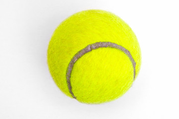 Tennis ball on grey background