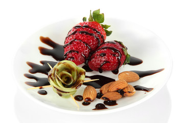 Fruit in chocolate isolated on white