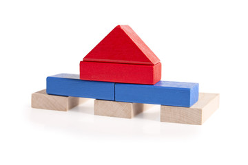 Wooden toy houses isolated on white
