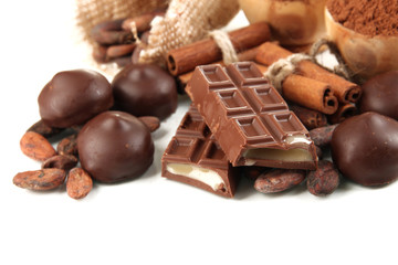 Composition of chocolate sweets, cocoa and spices, isolated