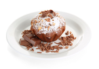 Fototapeta na wymiar Tasty muffin cake with powdered sugar and chocolate