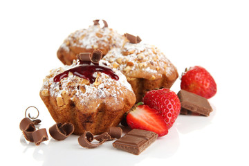 Tasty muffin cakes with strawberries and chocolate, isolated