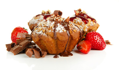 Tasty muffin cakes with strawberries and chocolate, isolated