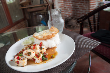 Fried rice with squid and fried egg