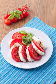 Italian salad caprese with tomatoes and mozzarella