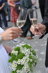 Weeding couple  toasting with Glasses of champagne