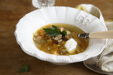 Mushroom soup with sour cream and parsley