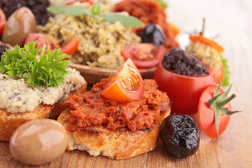 assortment of toast and tapenade