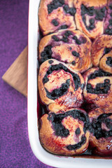 Buns with blueberry in the baking dish